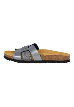 Slide sandal with black and gray straps, cork footbed, and textured metallic accents. Low-profile sole with a ridged pattern.