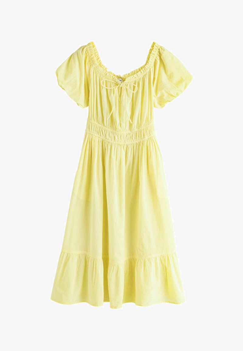 Robe jaune clair jusqu'aux genoux avec manches bouffantes, taille froncée, ourlet à volants et nœud à l'avant au niveau de l'encolure carrée.