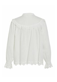 Biała bluzka wykonana z lekkiego materiału, z falbankowym kołnierzykiem, długimi rękawami oraz koronkowym wykończeniem przy mankietach i dole. Posiada detale guziczków.