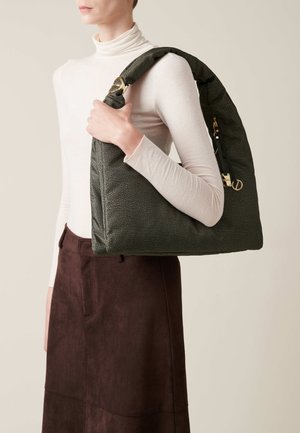 Green textured handbag with a soft, curved shape and a padded shoulder strap. Features gold hardware and a zip closure.
