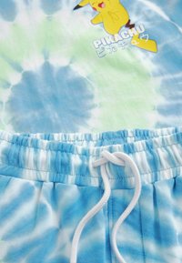 Next SHORT SLEEVE LICENSE AND SET - Verryttelyhousut - blue green