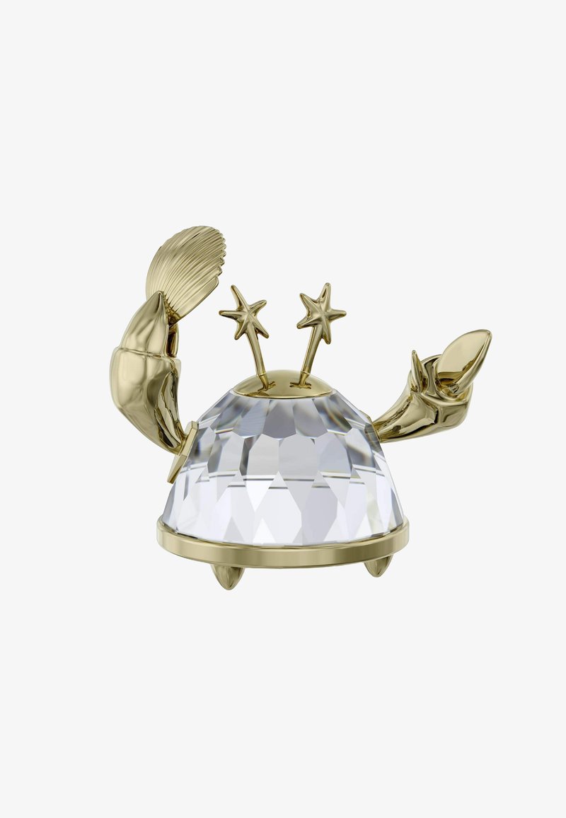 Figura di granchio in finitura dorata con un guscio di cristallo sfaccettato, due accenti a forma di stella e dettagli intricati delle chele. Texture liscia e finitura lucida.