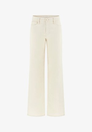 Krēmkrāsas plaša piegriezuma džinsi ar augstu vidukli, jostas cilpām, priekšējām kabatām un pogas aizdari. Izgatavoti no strukturētas džinsa auduma.