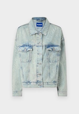 Light blue denim jacket with a cropped design, two chest pockets, silver buttons, and subtle logo pattern throughout.