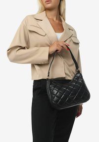 Miriade Borsa a mano - nero