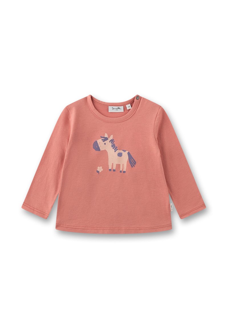 Langärmliges korallenfarbenes Shirt aus weicher Baumwolle mit einem lila und cremefarbenen Pferde-Motiv und kleinen Blumendetails nahe der Unterkante. Mit Druckknopfverschluss.