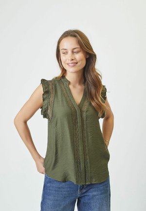 Olive green sleeveless blouse with ruffled shoulders, lace trim detailing, and a V-neck design, made from lightweight textured fabric.