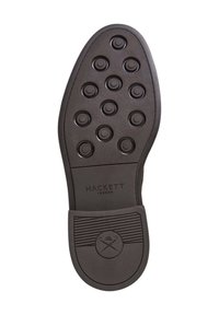 Semelle de chaussure élégante marron foncé avec des clous ronds en caoutchouc, talon texturé, marque Hackett London, et logo croisé parapluie et canne.