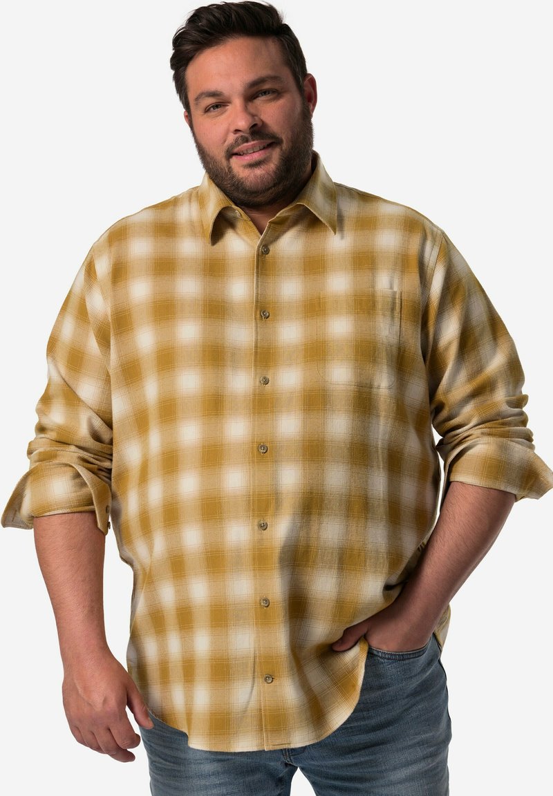 Camicia in flanella a quadri gialli con quadrati bianchi, design a bottoni, maniche lunghe arrotolate ai polsini, taschino sul petto e texture morbida.