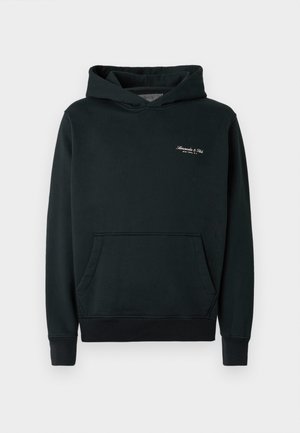 Sötétzöld kapucnis pulóver puha anyagból, elülső zsebbel és bordázott mandzsettával, valamint aljjal ellátva. Kis fehér logó a mellkason.