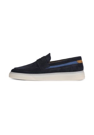 Marineblaues Wildleder-Schlupfschuh mit kontrastierendem blauen Streifen, weißer Gummisohle und gestickten Details. Minimalistisches Design mit dezentem braunen Akzent.