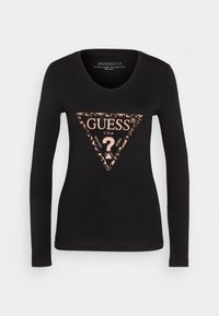 Schwarzes Langarm-T-Shirt mit einem rosa und goldenen Dreiecks-Logo, das "GUESS" und ein Fragezeichen zeigt. Hergestellt aus Bio-Baumwolle und Elasthan.