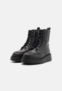 Levi's® Stivaletti con plateau - black