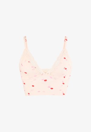 Hellrosa Bralette mit Spitzenbesatz und verstellbaren Trägern, verziert mit verstreuten roten und pinkfarbenen Lippenabdruckmustern.