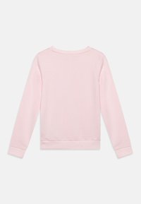 Rosa bomullgenser med lange ermer, rund hals, ribbede mansjetter og kant, glatt tekstur og minimalistisk design.