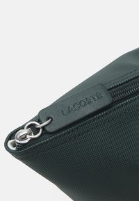 Lacoste Saco de mão - sinople