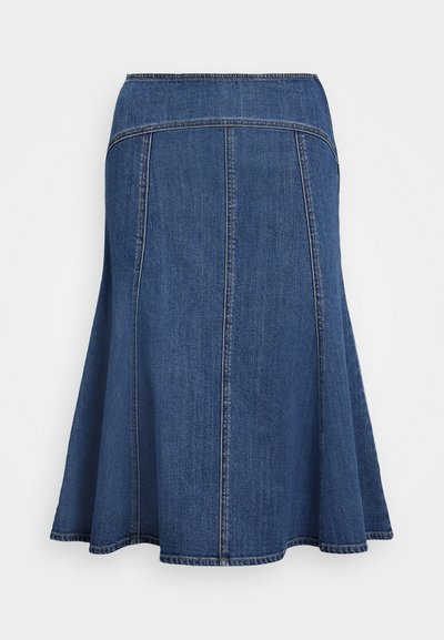 Denim svārki ar aplaistītu siluetu, tumši zila krāsa, ar augstu jostasvietu un redzamām šuvju detaļām gar šuvēm.