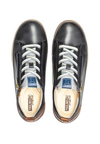 Black leather shoes with white and blue laces, side zipper, and light brown accents. Features a cushioned insole and logo tags.