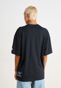 Nike Sportswear DANCE TEE - Apdrukāts T-krekls - black