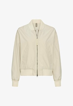 Jasnobeżowa kurtka bomber z przednim zamkiem błyskawicznym, ściągaczem przy kołnierzu, mankietach i dolnej krawędzi oraz dwoma skośnymi przednimi kieszeniami.