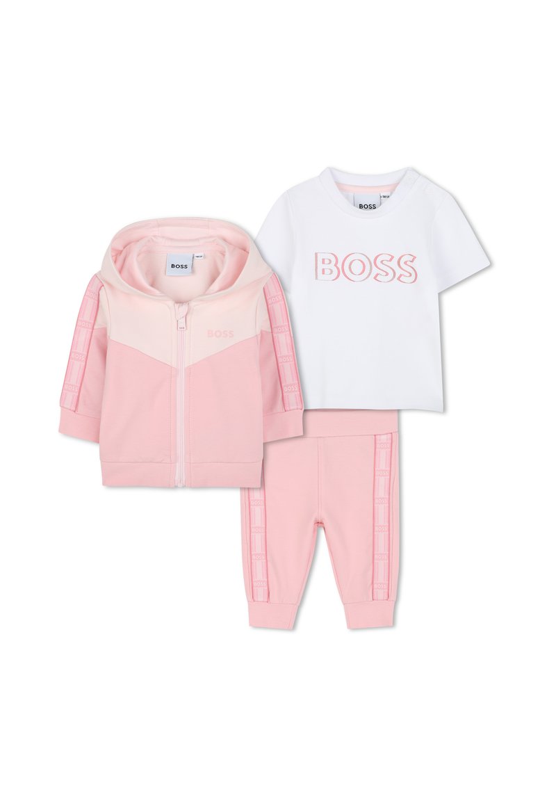 Pink three-piece children's tracksuit with zip-up hooded jacket, white T-shirt with "BOSS" logo, and matching pink pants with logo accents.