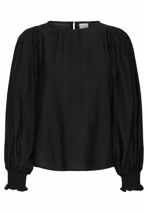 Blusa nera con maniche lunghe a sbuffo, scollo rotondo e polsini arricciati. Realizzata in un tessuto leggero con una finitura strutturata. Apertura a chiave sul retro.