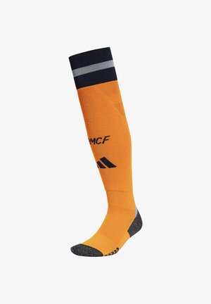 Knielange orange Socken mit einem strukturierten Muster, blauen und weißen Streifen am oberen Rand sowie schwarzen Akzenten an der Zehe und dem Logo.