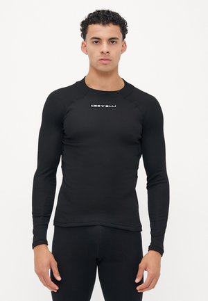 Schwarzes langärmliges Sportshirt aus glattem, dehnbarem Material. Verfügt über einen Rundhalsausschnitt und ein kleines weißes "Castelli"-Logo auf der Brust.