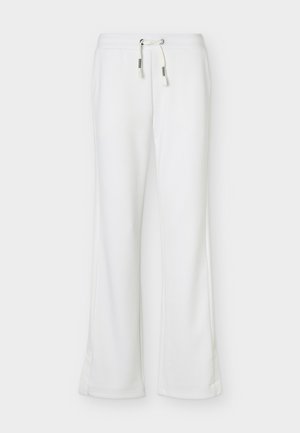 Pantalon de survêtement blanc à coupe ample avec ceinture à cordon et jambes droites, présenté sur un fond uni.