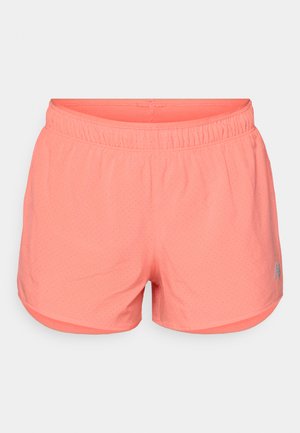Bright coral athletic shorts with an elastic waistband, made from breathable fabric featuring small perforations for ventilation.