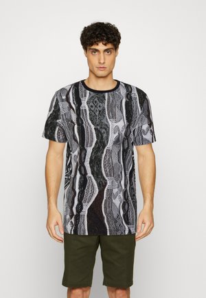 T-shirt oversize Pigalle con stampa in Nero - Balenciaga