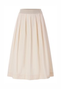 Jupe plissée en tissu beige clair, dotée d'une taille élastique. Le design est évasé, s'étendant jusqu'au mi-mollet avec une texture lisse.