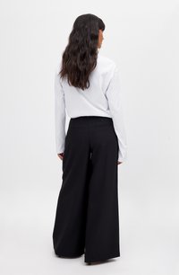 NA-KD Trousers - black