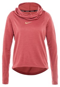 Long-sleeve athletic top in coral with a cowl neck. Features a gold Nike logo and thumbholes. Made of lightweight, textured fabric.