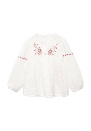 Blouse blanche à manches longues avec col rond, boutons sur le devant et broderie florale rose sur la poitrine et les manches.