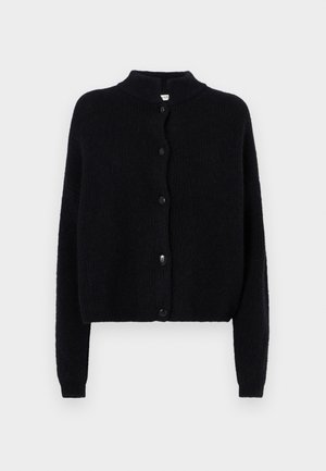 Melnā adītā džempera ar apaļu kakla izgriezumu, priekšējo pogu aizdari un garām piedurknēm. Teksturēts audums ar īsu apakšmalu.