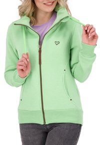 Sudadera con cremallera de color verde menta, con bolsillos, puños acanalados y un pequeño logo de corazón. Incluye una cremallera marrón y cordones para un ajuste ajustable.