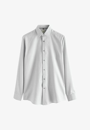 Hellgraues Button-up-Hemd mit langen Ärmeln, einem Kragen und einer glatten Textur. Verfügt über sechs Knöpfe an der Vorderseite und einen abgerundeten Saum.