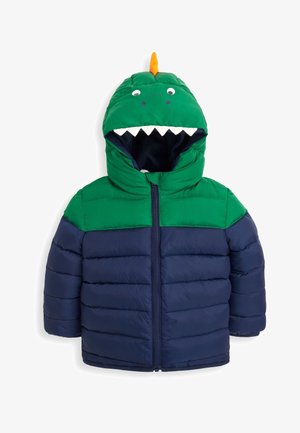 Zelena in mornarska pihasta jakna z kapuco v obliki dinozavra, ki ima bele zobe, okrogli oči in oranžno hrbtno plavut. Zadrga na sprednji strani.