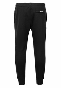 Svarta joggingbyxor i mjukt tyg, med elastisk midja, ribbade muddar och en bakficka med logotypdetalj.