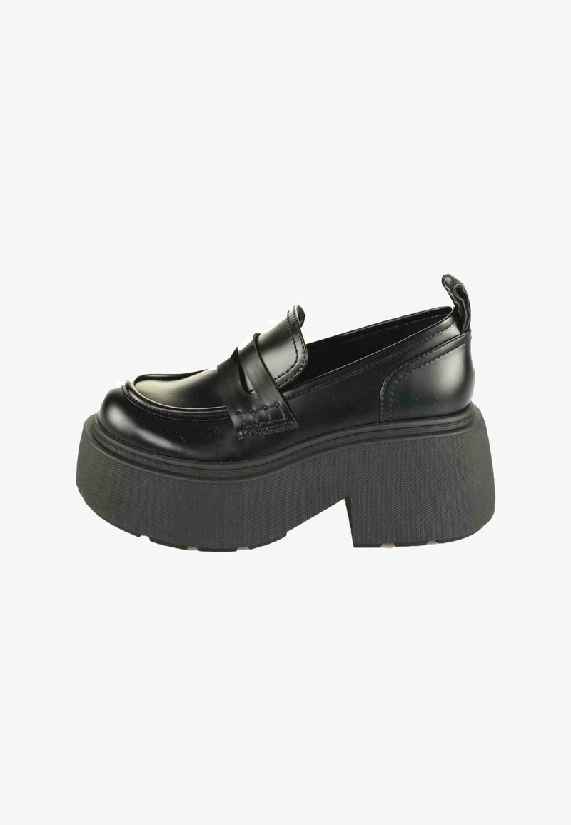 Mustat nahka loaferit, joissa on erottuva paksu musta platform-pohja, joka sisältää ommellun kuvion ja hihan yläosan yli.