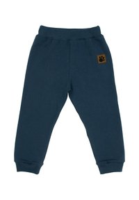 Granatowe spodnie dresowe z miękkiego materiału, z prążkowanym pasem i mankietami. Zawierają małą brązową kwadratową naszywkę z odciskiem łapy.