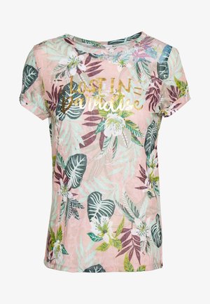 Chemise rose à manches courtes avec des feuilles et fleurs tropicales vertes et blanches, ornée du texte doré « Perdu au paradis » sur le devant.