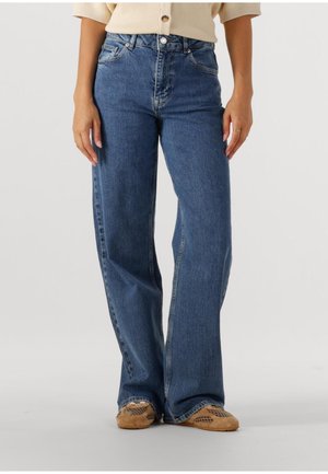 Breda ben, blå denimjeans med medelhög midja, fem fickor och blekt utseende. Har en klassisk knappstängning och sömdetaljer.