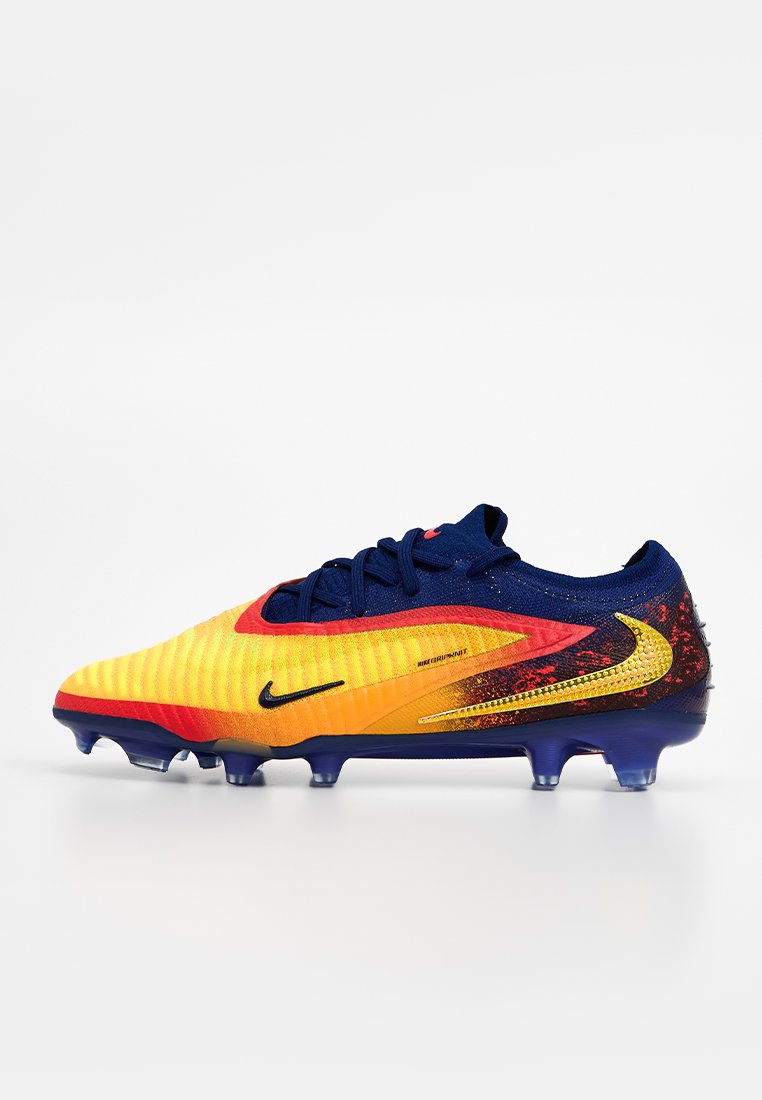 Botines de fútbol para terreno firme