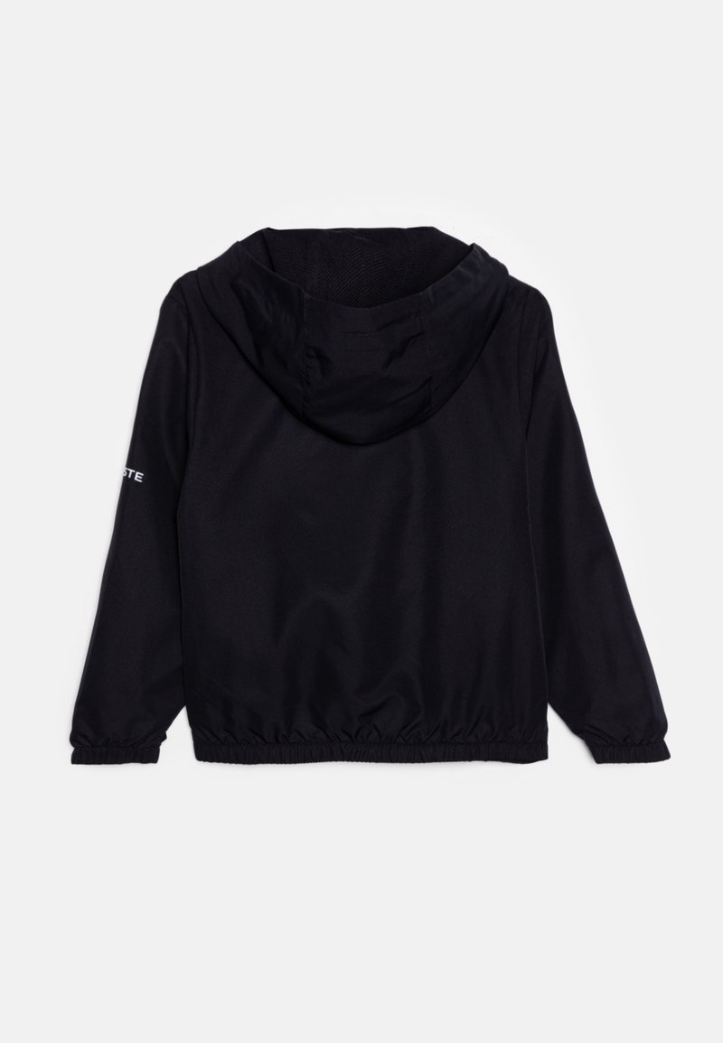 Lacoste SPORTS JACKET Veste de survêtement abysm/bleu marine