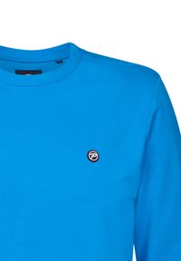 Felpa blu con colletto rotondo in cotone, con un piccolo logo rotondo ricamato sulla parte sinistra del petto. Texture liscia, design casual.