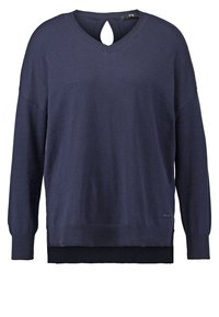 Pull bleu marine à manches longues avec col en V et découpe en trou de serrure dans le dos, poignets et ourlet côtelés.