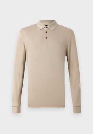 Beige long-sleeve polo shirt made of smooth cotton with a collar, three black buttons, and a logo embroidered on the chest.