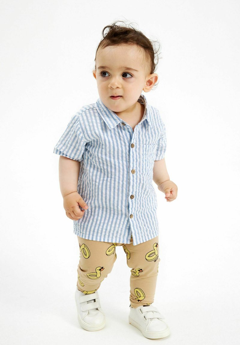 The New Siblings KUBBER - Leggings - Trousers - cornstalk rubber duck aop